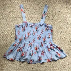 Blue smocked tank top with floral detailing